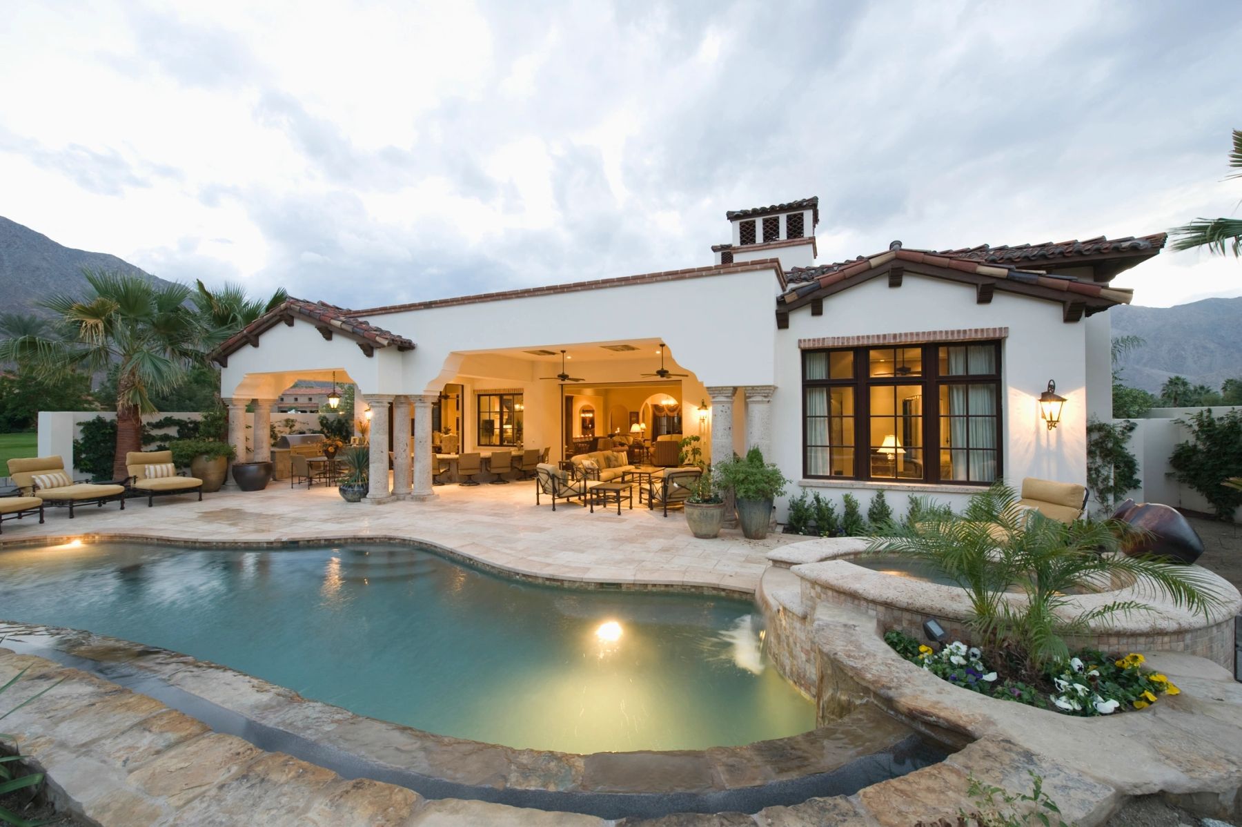 House and pool in a landscaped setting